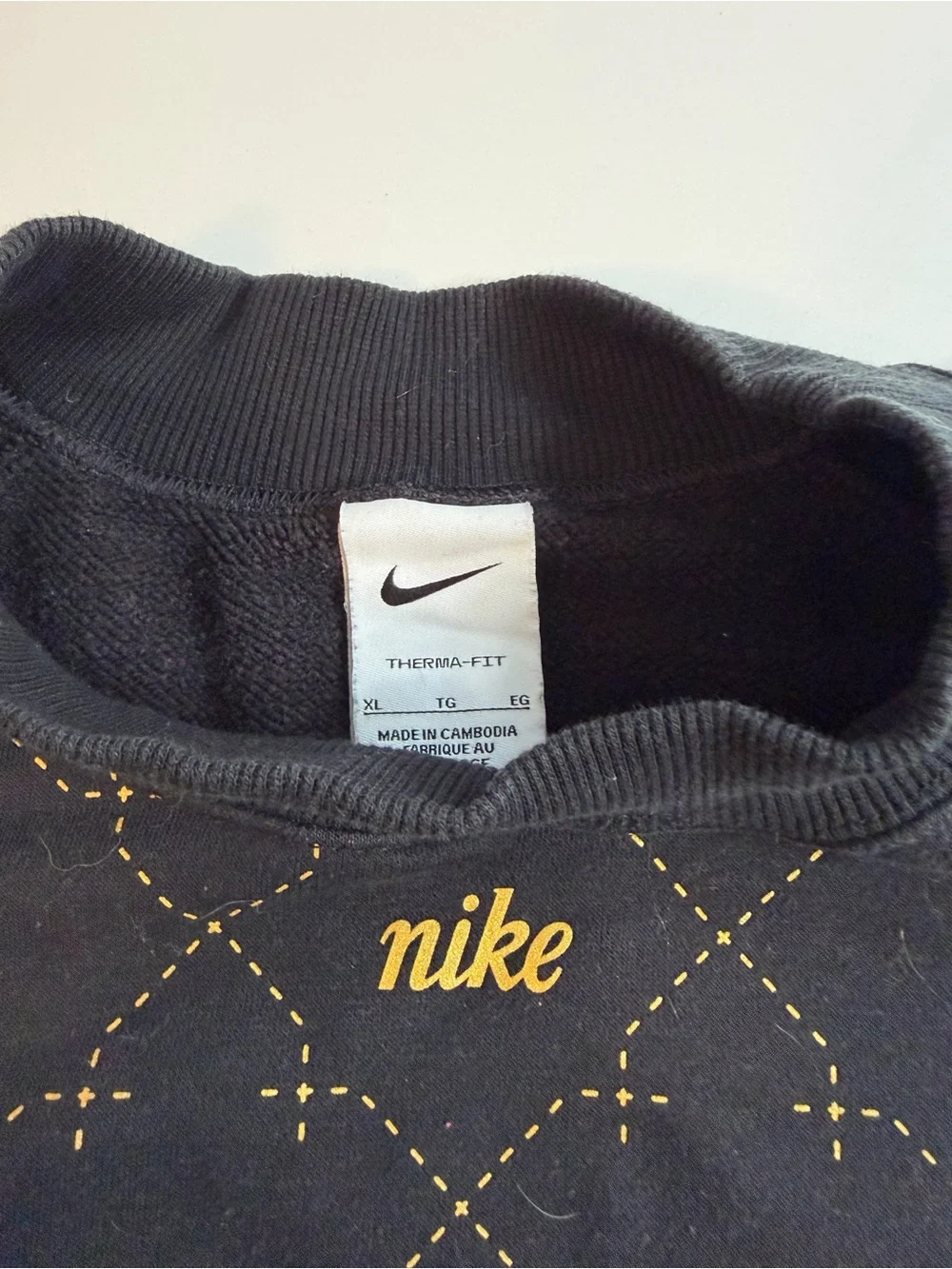 Nike Women’s Black Crewneck Sweatshirt with Gold Stitching